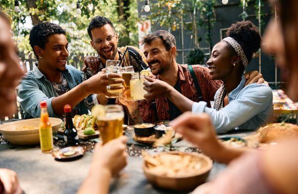 young-happy-friends-having-fun-while-toasting