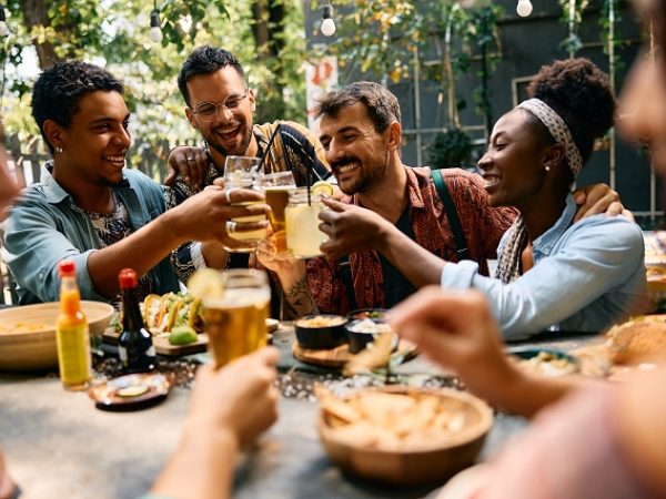 young-happy-friends-having-fun-while-toasting